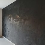 betonlook zwarte muur